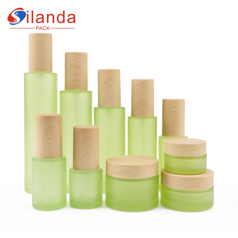 Eco Friendly Green Bamboo Lid Glass Skincare Bottle Set Cosmetic Toner Lotion Serum Pump Bottles Cream Jars 